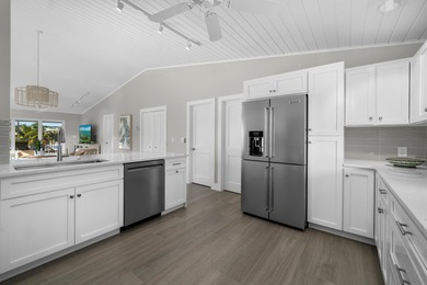 Experience the ease and elegance of true island living in this on Key Colony Beach Golf Course in Florida - for sale on GolfHomes.com, golf home, golf lot