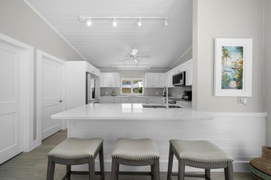 Experience the ease and elegance of true island living in this on Key Colony Beach Golf Course in Florida - for sale on GolfHomes.com, golf home, golf lot