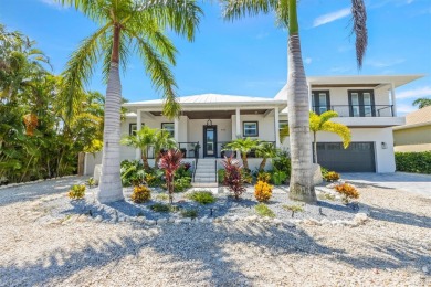 This new construction is a dream come true for boaters and water on Key Royale Club in Florida - for sale on GolfHomes.com, golf home, golf lot