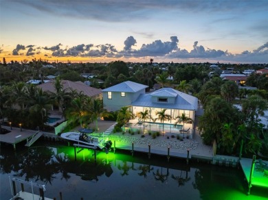 This new construction is a dream come true for boaters and water on Key Royale Club in Florida - for sale on GolfHomes.com, golf home, golf lot