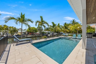 This new construction is a dream come true for boaters and water on Key Royale Club in Florida - for sale on GolfHomes.com, golf home, golf lot