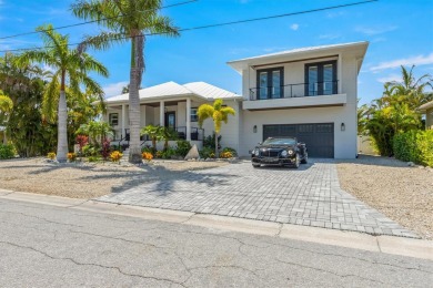 This new construction is a dream come true for boaters and water on Key Royale Club in Florida - for sale on GolfHomes.com, golf home, golf lot