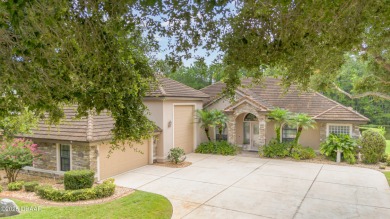 Located in the prestigious guard-gated Spruce Creek Fly-In on Spruce Creek Golf Club in Florida - for sale on GolfHomes.com, golf home, golf lot