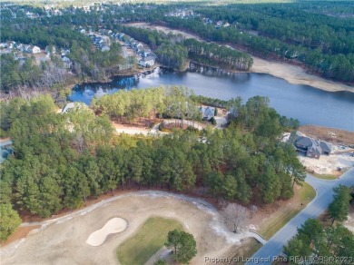 This wooded golf front home site is located in the gated on Anderson Creek Golf Club in North Carolina - for sale on GolfHomes.com, golf home, golf lot