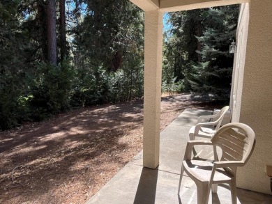 Beautiful location amongst pines and cedar with peekaboo view of on Forest Meadows Golf Course in California - for sale on GolfHomes.com, golf home, golf lot