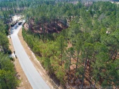 This wooded golf front home site is located in the gated on Anderson Creek Golf Club in North Carolina - for sale on GolfHomes.com, golf home, golf lot