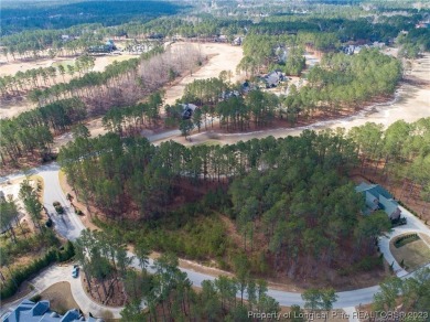 This wooded golf front home site is located in the gated on Anderson Creek Golf Club in North Carolina - for sale on GolfHomes.com, golf home, golf lot