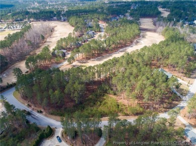 This wooded golf front home site is located in the gated on Anderson Creek Golf Club in North Carolina - for sale on GolfHomes.com, golf home, golf lot