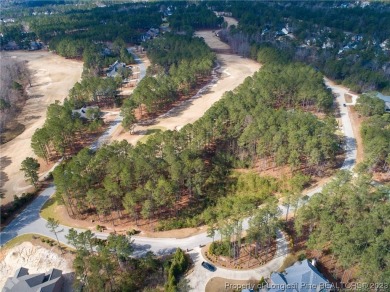 This wooded golf front home site is located in the gated on Anderson Creek Golf Club in North Carolina - for sale on GolfHomes.com, golf home, golf lot