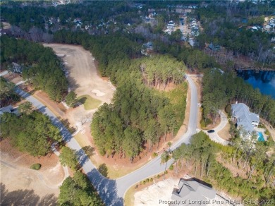 This wooded golf front home site is located in the gated on Anderson Creek Golf Club in North Carolina - for sale on GolfHomes.com, golf home, golf lot