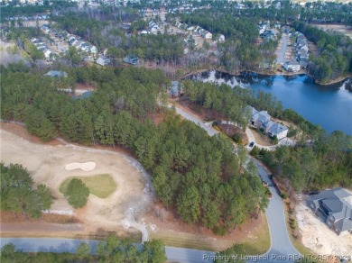 This wooded golf front home site is located in the gated on Anderson Creek Golf Club in North Carolina - for sale on GolfHomes.com, golf home, golf lot