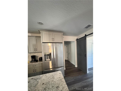 New home on corner lot. 2025 build. Has a wooded border in the on Citrus Springs Country Club in Florida - for sale on GolfHomes.com, golf home, golf lot