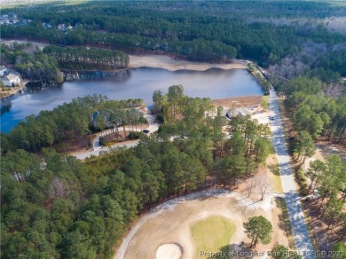 This wooded golf front home site is located in the gated on Anderson Creek Golf Club in North Carolina - for sale on GolfHomes.com, golf home, golf lot