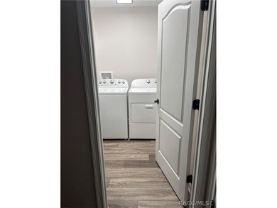 New home on corner lot. 2025 build. Has a wooded border in the on Citrus Springs Country Club in Florida - for sale on GolfHomes.com, golf home, golf lot