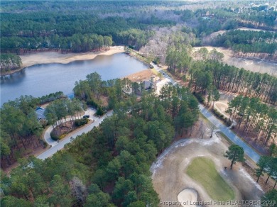 This wooded golf front home site is located in the gated on Anderson Creek Golf Club in North Carolina - for sale on GolfHomes.com, golf home, golf lot