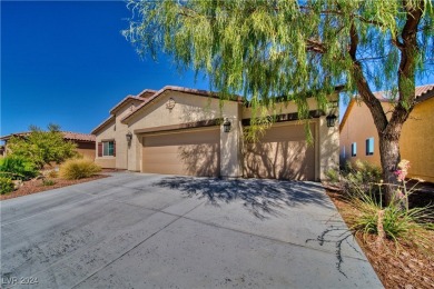 This beautiful single-story home features 2 bedrooms and a on Mountain Falls Golf Course in Nevada - for sale on GolfHomes.com, golf home, golf lot