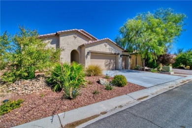 This beautiful single-story home features 2 bedrooms and a on Mountain Falls Golf Course in Nevada - for sale on GolfHomes.com, golf home, golf lot