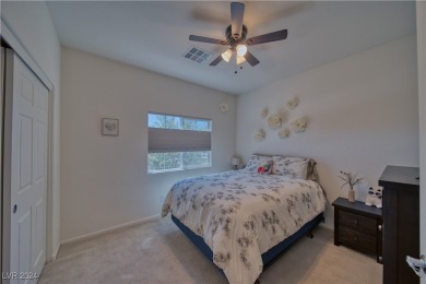 This beautiful single-story home features 2 bedrooms and a on Mountain Falls Golf Course in Nevada - for sale on GolfHomes.com, golf home, golf lot