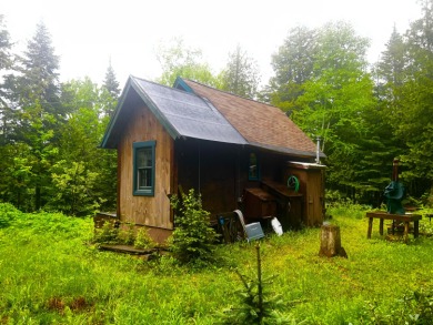 HERE'S A CHANCE to own a cabin on the Saddleback Mountain Road on Evergreen Golf Club in Maine - for sale on GolfHomes.com, golf home, golf lot