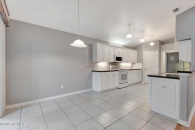 Welcome to this beautifully maintained 3-bedroom, 2-bathroom on The Golf Club At Cypress Head in Florida - for sale on GolfHomes.com, golf home, golf lot
