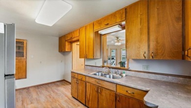 Welcome to this charming rambler that overlooks Sauk Lake and is on Sauk Centre Country Club in Minnesota - for sale on GolfHomes.com, golf home, golf lot