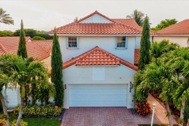 WELCOME TO YOUR DREAM HOME IN THE DESIRABLE DORAL GLEN COMMUNITY on Jim McLean Signature Course in Florida - for sale on GolfHomes.com, golf home, golf lot