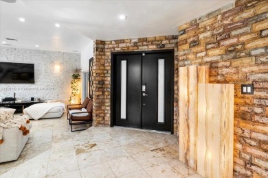 WELCOME TO YOUR DREAM HOME IN THE DESIRABLE DORAL GLEN COMMUNITY on Jim McLean Signature Course in Florida - for sale on GolfHomes.com, golf home, golf lot