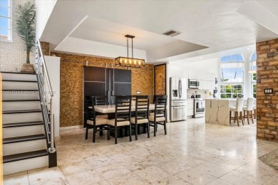 WELCOME TO YOUR DREAM HOME IN THE DESIRABLE DORAL GLEN COMMUNITY on Jim McLean Signature Course in Florida - for sale on GolfHomes.com, golf home, golf lot