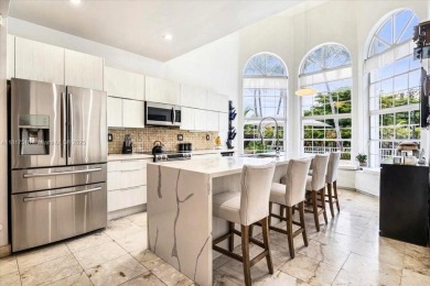 WELCOME TO YOUR DREAM HOME IN THE DESIRABLE DORAL GLEN COMMUNITY on Jim McLean Signature Course in Florida - for sale on GolfHomes.com, golf home, golf lot
