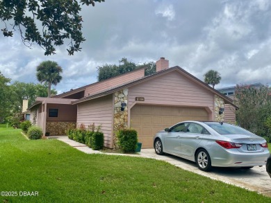 Discover the charm of this 2 bedroom, 2 and 1/2 bath home in the on The Club At Pelican Bay - North Course in Florida - for sale on GolfHomes.com, golf home, golf lot