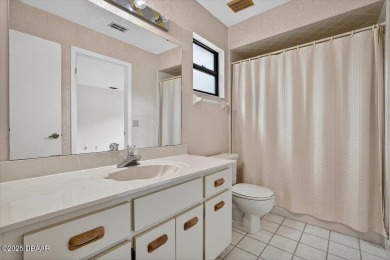 Discover the charm of this 3 bedroom, 2 and 1/2 bath home in the on The Club At Pelican Bay - North Course in Florida - for sale on GolfHomes.com, golf home, golf lot