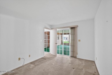 Discover the charm of this 3 bedroom, 2 and 1/2 bath home in the on The Club At Pelican Bay - North Course in Florida - for sale on GolfHomes.com, golf home, golf lot