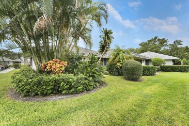 Located in the highly desirable Club Cottages within PGA on PGA National Golf Club in Florida - for sale on GolfHomes.com, golf home, golf lot