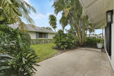Located in the highly desirable Club Cottages within PGA on PGA National Golf Club in Florida - for sale on GolfHomes.com, golf home, golf lot