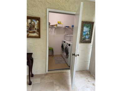 Experience a seamless blend of Spanish-style architecture and on IMG Academies Golf and Country Club in Florida - for sale on GolfHomes.com, golf home, golf lot