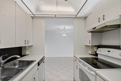 Needs some TLC for this nice Unit in Wynmoor Golf Village where on Wynmoor Golf Course in Florida - for sale on GolfHomes.com, golf home, golf lot