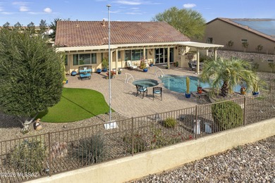 This ideally located and beautiful home is comprised of on Saddlebrooke Ranch Golf Club in Arizona - for sale on GolfHomes.com, golf home, golf lot