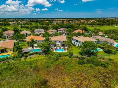 Nestled on the golf course & water in Parkland Golf & Country on Parkland Golf Club in Florida - for sale on GolfHomes.com, golf home, golf lot