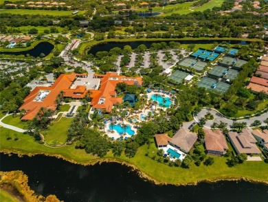 Nestled on the golf course & water in Parkland Golf & Country on Parkland Golf Club in Florida - for sale on GolfHomes.com, golf home, golf lot