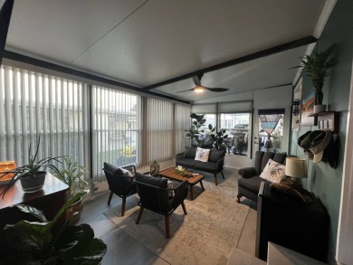 This beautifully updated 2-bedroom, 2-bathroom unfurnished home on Lake Henry Golf Club in Florida - for sale on GolfHomes.com, golf home, golf lot