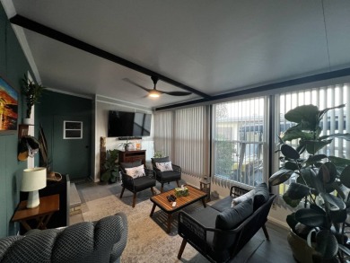 This beautifully updated 2-bedroom, 2-bathroom unfurnished home on Lake Henry Golf Club in Florida - for sale on GolfHomes.com, golf home, golf lot