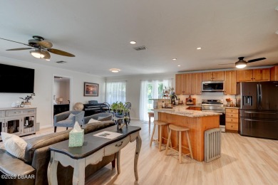 Charming 3-Bedroom Home with Pond Views & Golf Course Access
 on Riviera Country Club in Florida - for sale on GolfHomes.com, golf home, golf lot