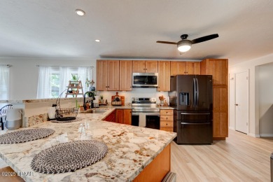 Charming 3-Bedroom Home with Pond Views & Golf Course Access
 on Riviera Country Club in Florida - for sale on GolfHomes.com, golf home, golf lot