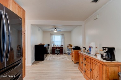 Charming 3-Bedroom Home with Pond Views & Golf Course Access
 on Riviera Country Club in Florida - for sale on GolfHomes.com, golf home, golf lot
