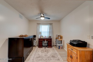 Charming 3-Bedroom Home with Pond Views & Golf Course Access
 on Riviera Country Club in Florida - for sale on GolfHomes.com, golf home, golf lot