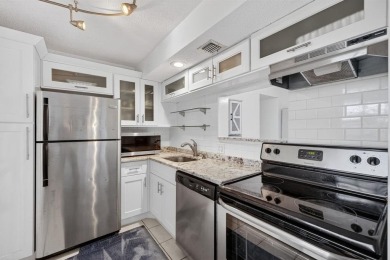 A bright and spacious 2-bedroom, 2-bathroom condo located in the on Palm-Aire Country Club and Resort - Palms in Florida - for sale on GolfHomes.com, golf home, golf lot