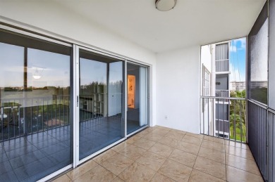 A bright and spacious 2-bedroom, 2-bathroom condo located in the on Palm-Aire Country Club and Resort - Palms in Florida - for sale on GolfHomes.com, golf home, golf lot