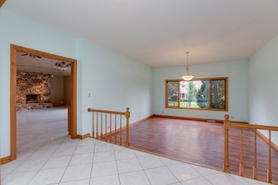 Opportunity knocks ~ this huge open layout brick ranch with a on St. Andrews Golf and Country Club in Illinois - for sale on GolfHomes.com, golf home, golf lot
