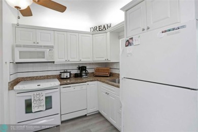 Enjoy spacious, open-concept living with stunning views in this on Sunrise Lakes Phase IV Golf Course in Florida - for sale on GolfHomes.com, golf home, golf lot