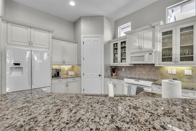 Welcome home to this elegant and well-maintained Stock Tivoli on The Classics Country Club At Lely Resort in Florida - for sale on GolfHomes.com, golf home, golf lot